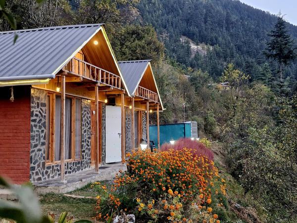 Cottage with flowers and hills